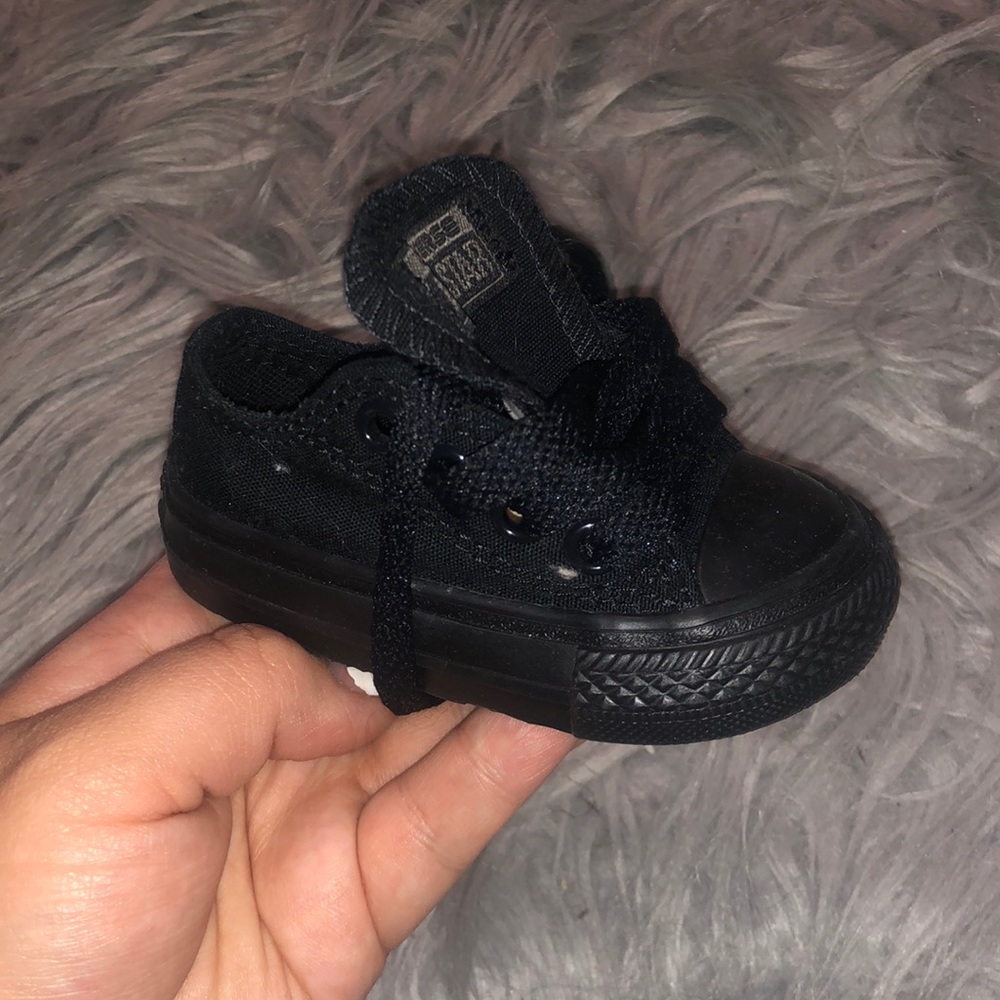 All black low top infant converse sneakers